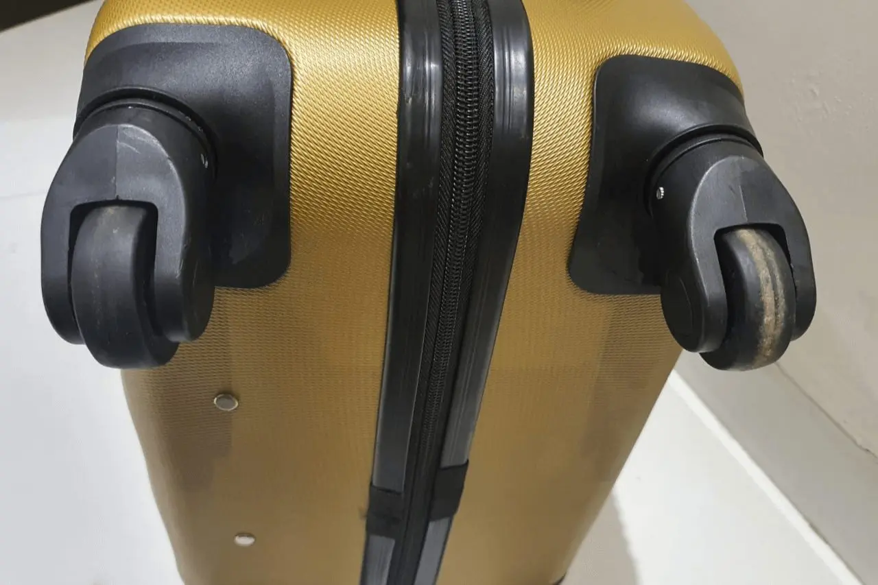 how to make luggage wheels smoother